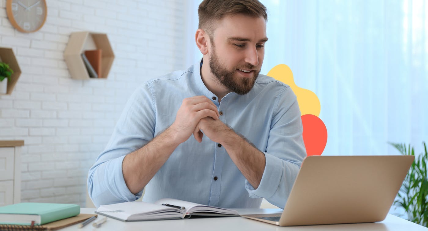 Young business man looking at his laptop